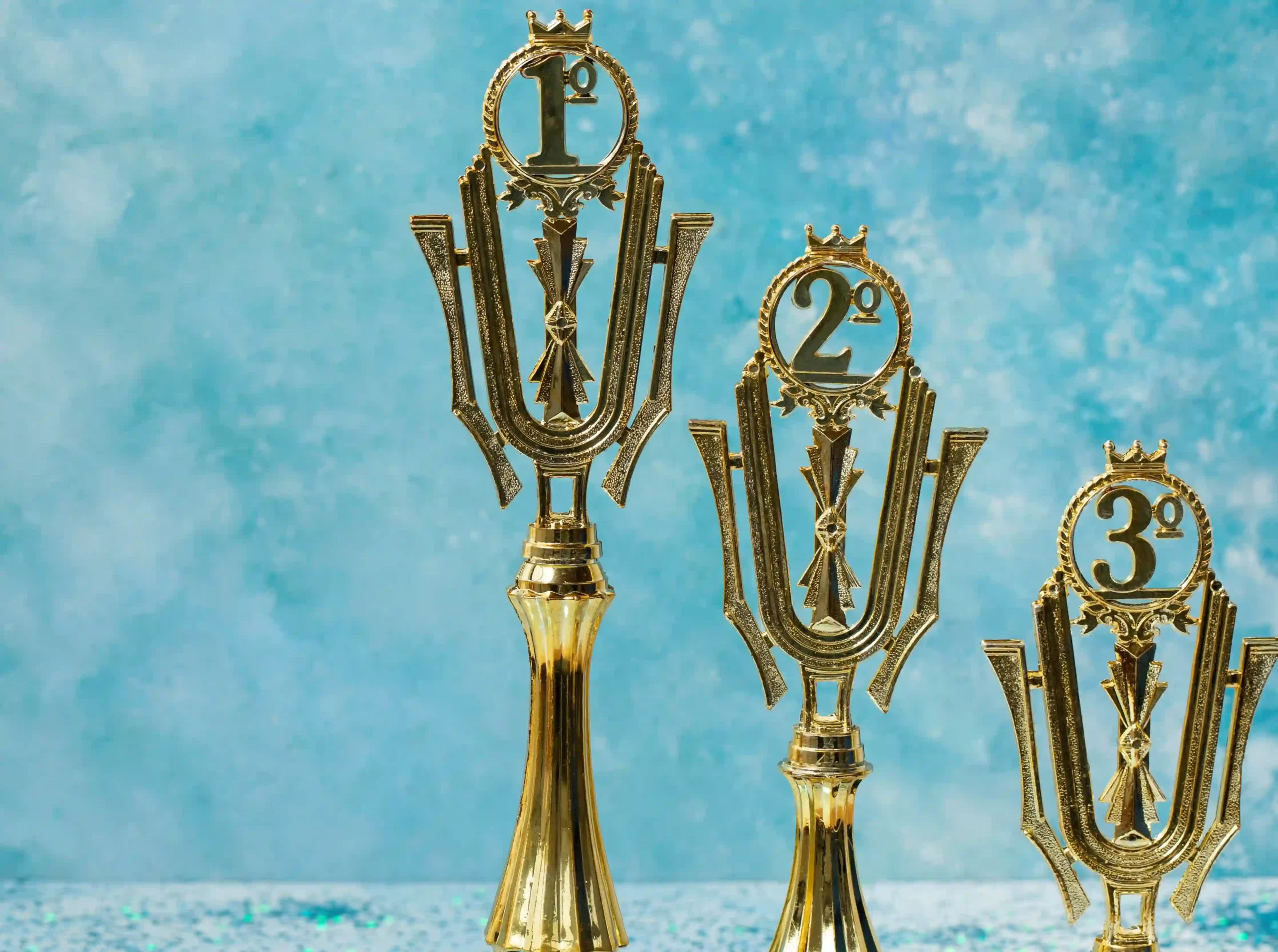 3 golden trophies