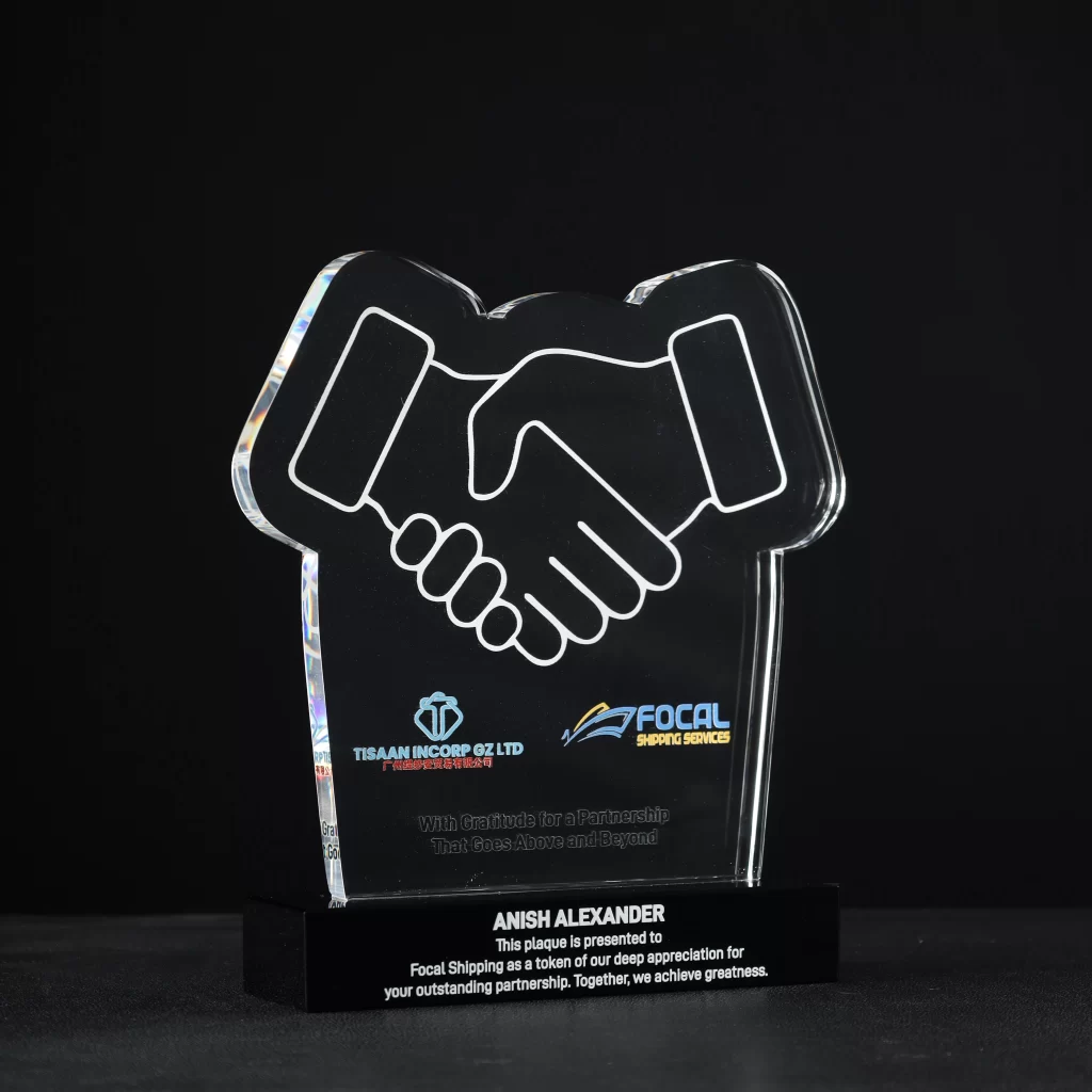 Engraved crystal handshake award for corporate recognition